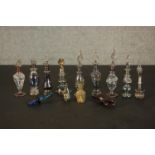 A collection of perfume and snuff bottles, including nine hand blown glass Egyptian bottles with