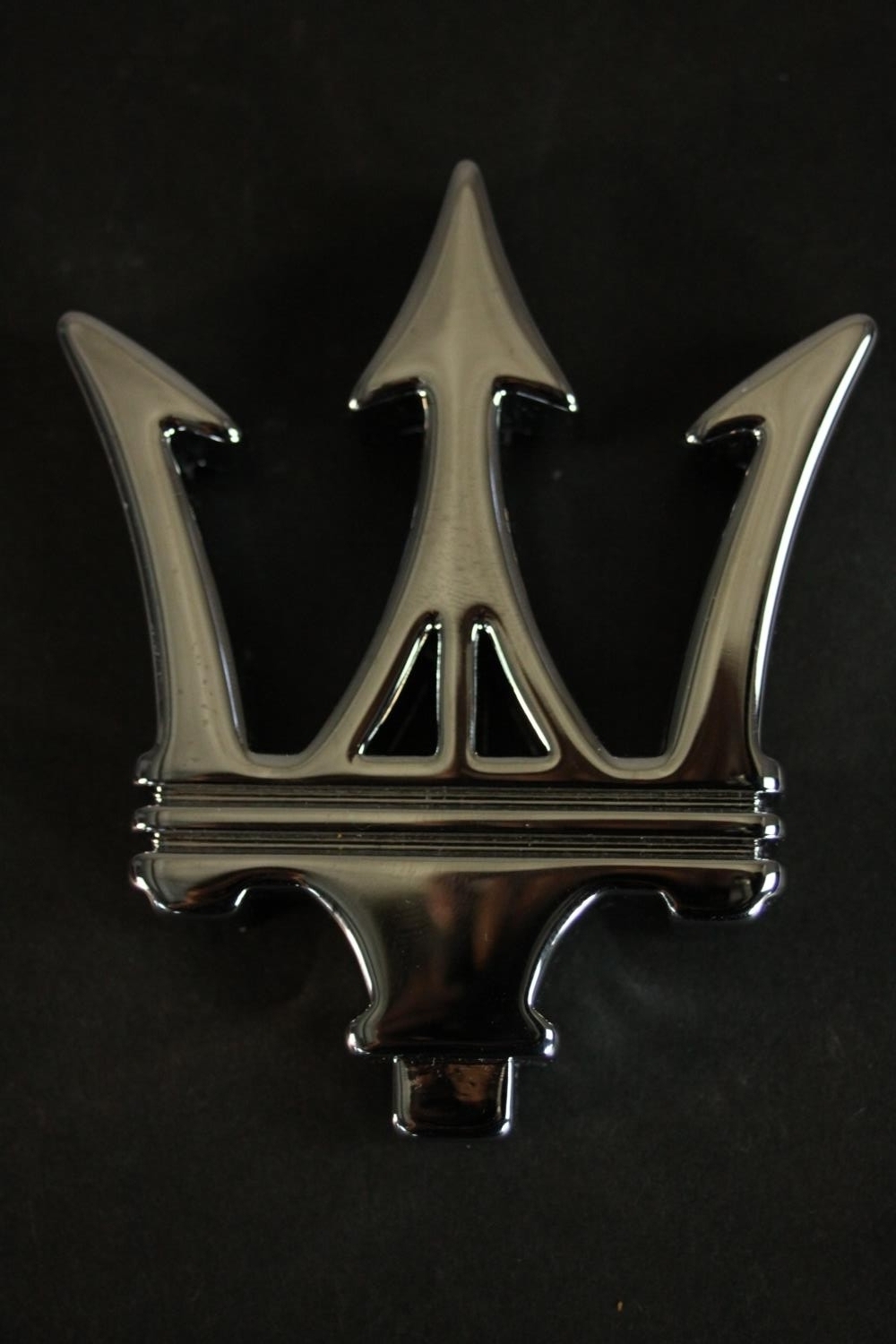 A boxed silver plated Maserati emblem paperweight. H.3 W.10 D.11.5cm. (box). - Image 4 of 5