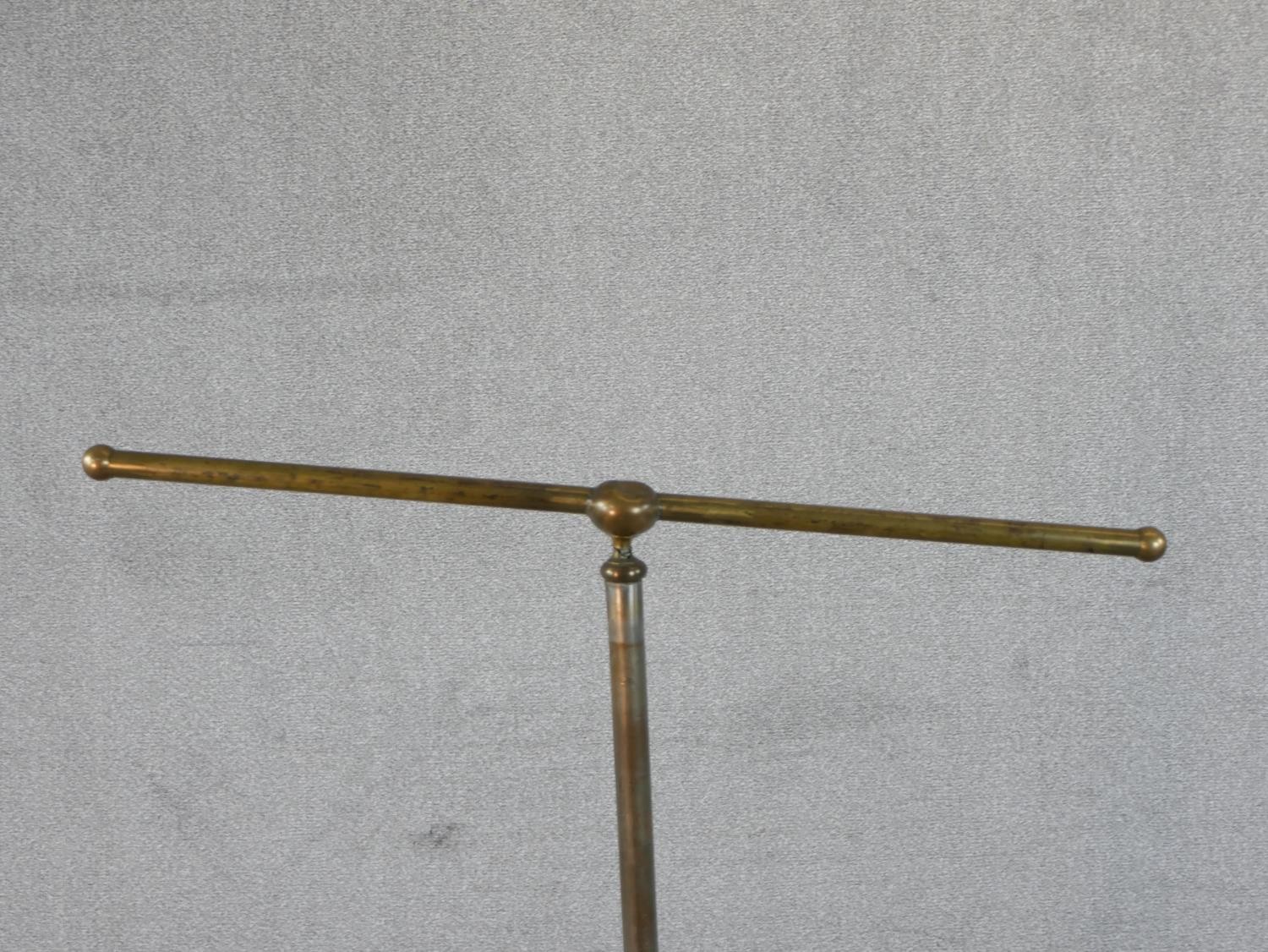 A C.1900 tubular metal towel rail of T form, on a circular cast iron base. H.121 W.72cm - Image 2 of 4