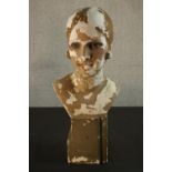 A circa 1930's painted plaster female mannequin bust. Damaged. H.57 W.27 D.25cm.