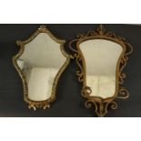 An early 20th century Italian girandole mirror in a gilt wrought iron frame with scrolling