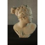 After Antonio Canova, a reconstituted stone bust of Venus. H.60 W.40 D.23cm.