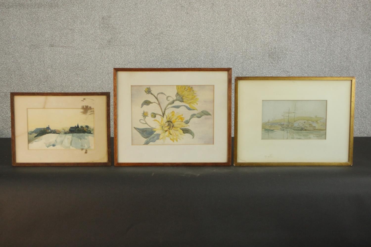 Three framed and glazed watercolours, sunflowers, boats in the harbour and a countryside