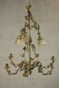 An early 20th century gilt spelter floral and foliate design chandelier, three electric floral