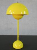 A contemporary flowerpot desk lamp in yellow by Louis Poulsen for Verner Panton. Domed half sphere