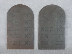 Two brass signs in the style of the tablets with the Hebrew scripture of the ten commandments. H.