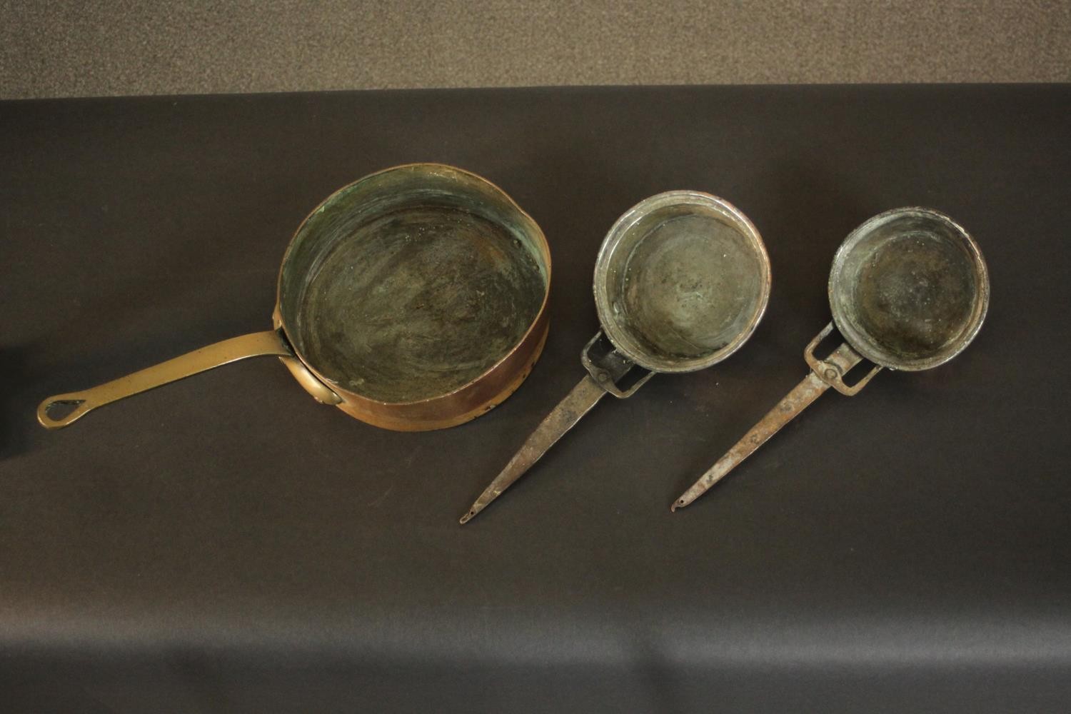 Three 19th century brass and copper pans. H.8 Dia.26cm. (largest) - Image 3 of 10