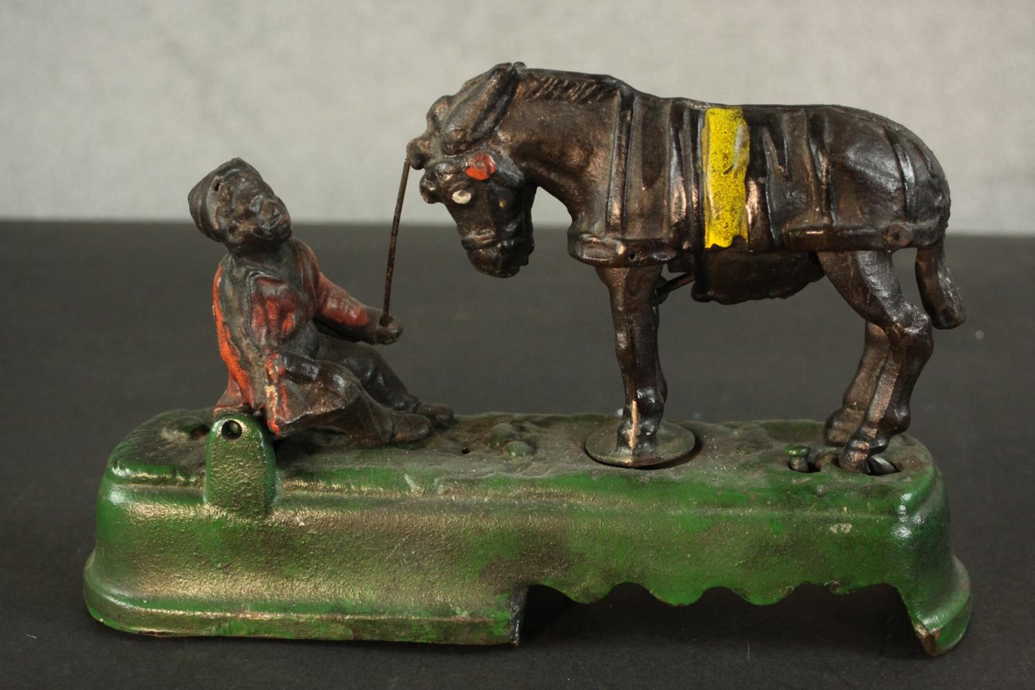 A vintage style painted cast iron mechanical money box of a boy and horse. The horse bucks - Image 4 of 5