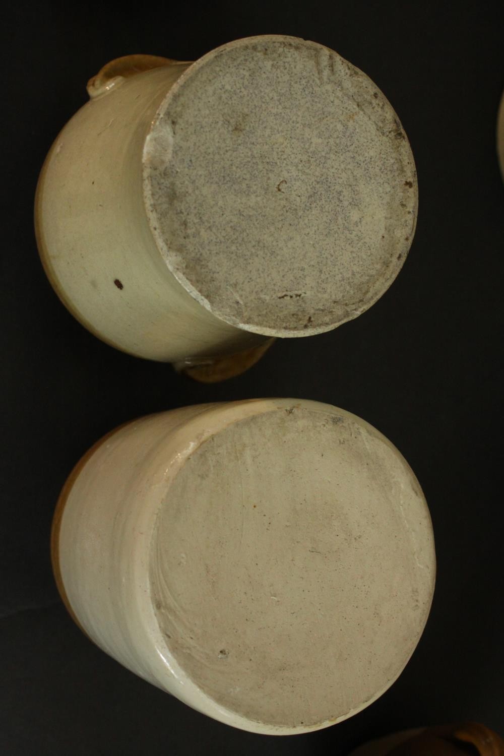 A collection of early 20th century honey glaze earthenware food storage jars, three with brass lids. - Image 6 of 8