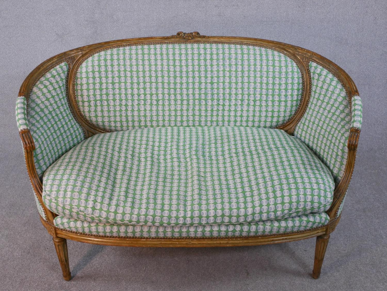 A carved Louis XVI style canape reupholstered in a retro style pale sage patterned material. H.91 - Image 4 of 6