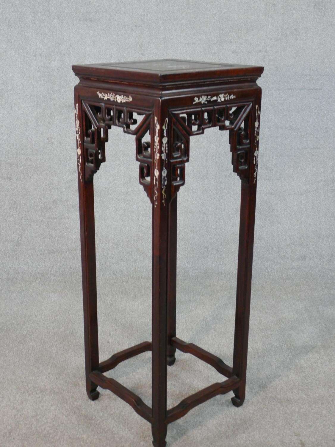 A Chinese carved and pierced hardwood urn stand inlaid with mother of pearl bird and floral - Image 2 of 5