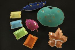 A collection of porcelain, including three Belvedere Limoges hand painted leaf form dishes gilded