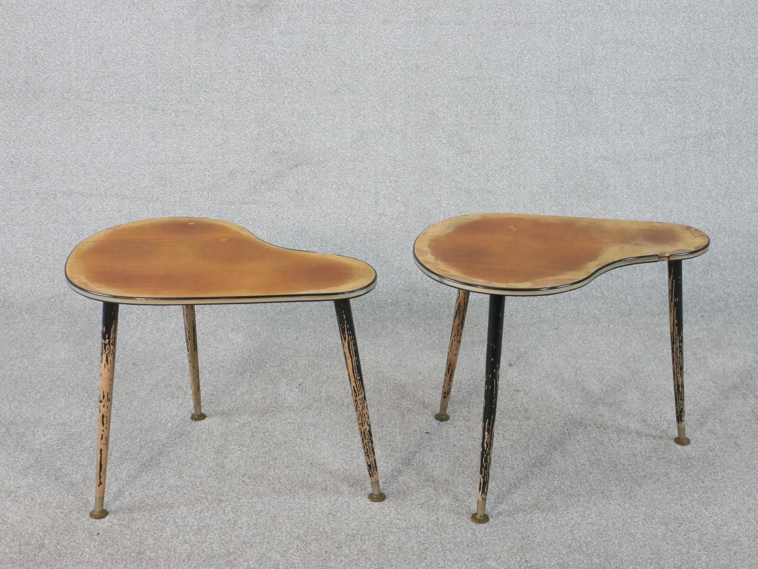 A pair of mid century shaped top occasional tables with lacquered tops on dansette supports. H.40