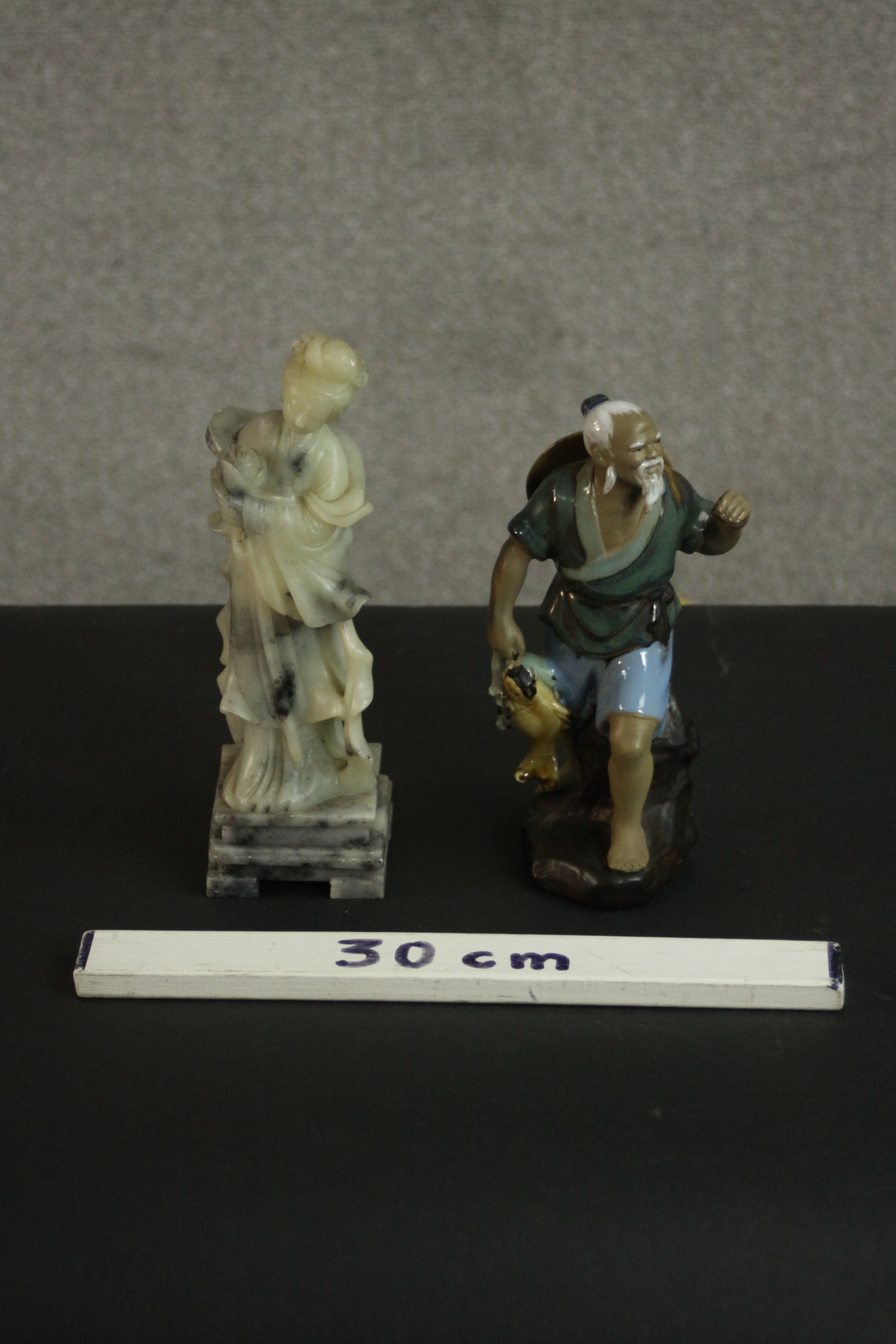 A carved Chinese soapstone figure of a female deity along with a hand painted clay figure of a - Image 2 of 16