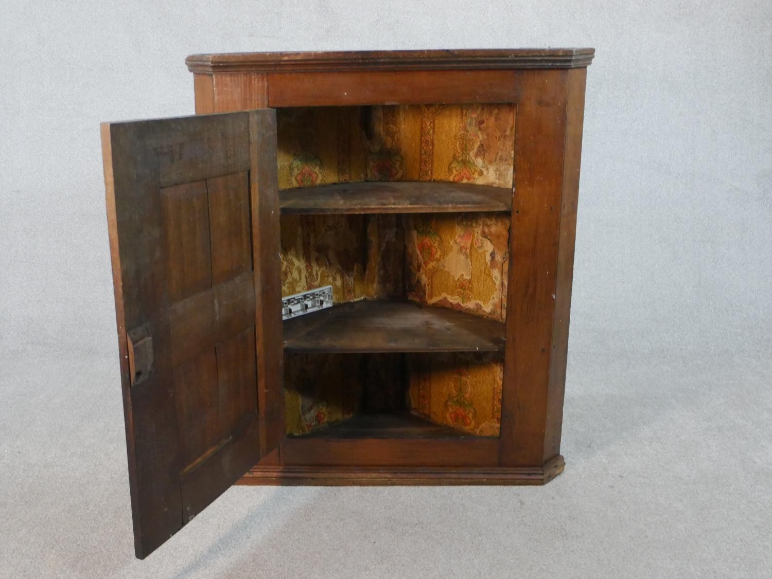 A 19th century oak hanging corner cabinet with panel door enclosing two shelves. H.106 W.94.5 W.46cm - Image 4 of 5
