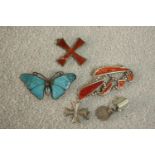 A collection of silver and enamel jewellery, including a silver and blue enamel butterfly brooch (