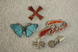 A collection of silver and enamel jewellery, including a silver and blue enamel butterfly brooch (