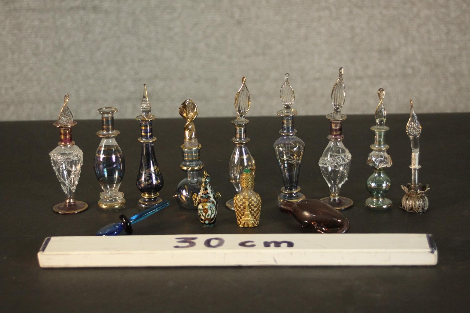 A collection of perfume and snuff bottles, including nine hand blown glass Egyptian bottles with - Image 2 of 11