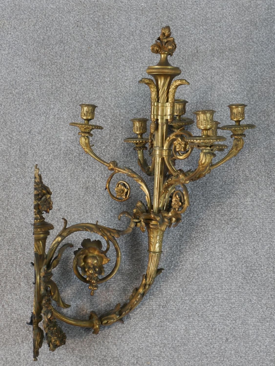 A late 19th century ormolu wall applique, the torch form wall mount hung with garlands of flowers - Image 5 of 8