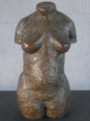 An imitation bronze fibreglass sculpture of a female torso. H.50 W.31 D.20cm