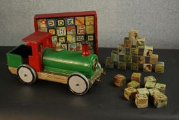 Two boxes of mid 20th century child's letter blocks along with a vintage hand made carved and