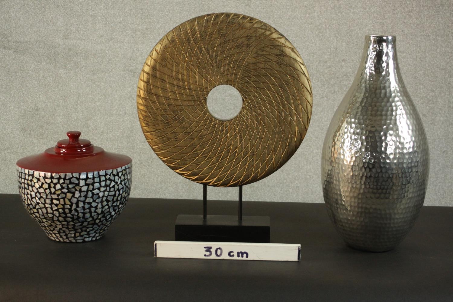 A modern carved gold painted disc on stand along with a silver glaze vase with stippled design and a - Image 2 of 10
