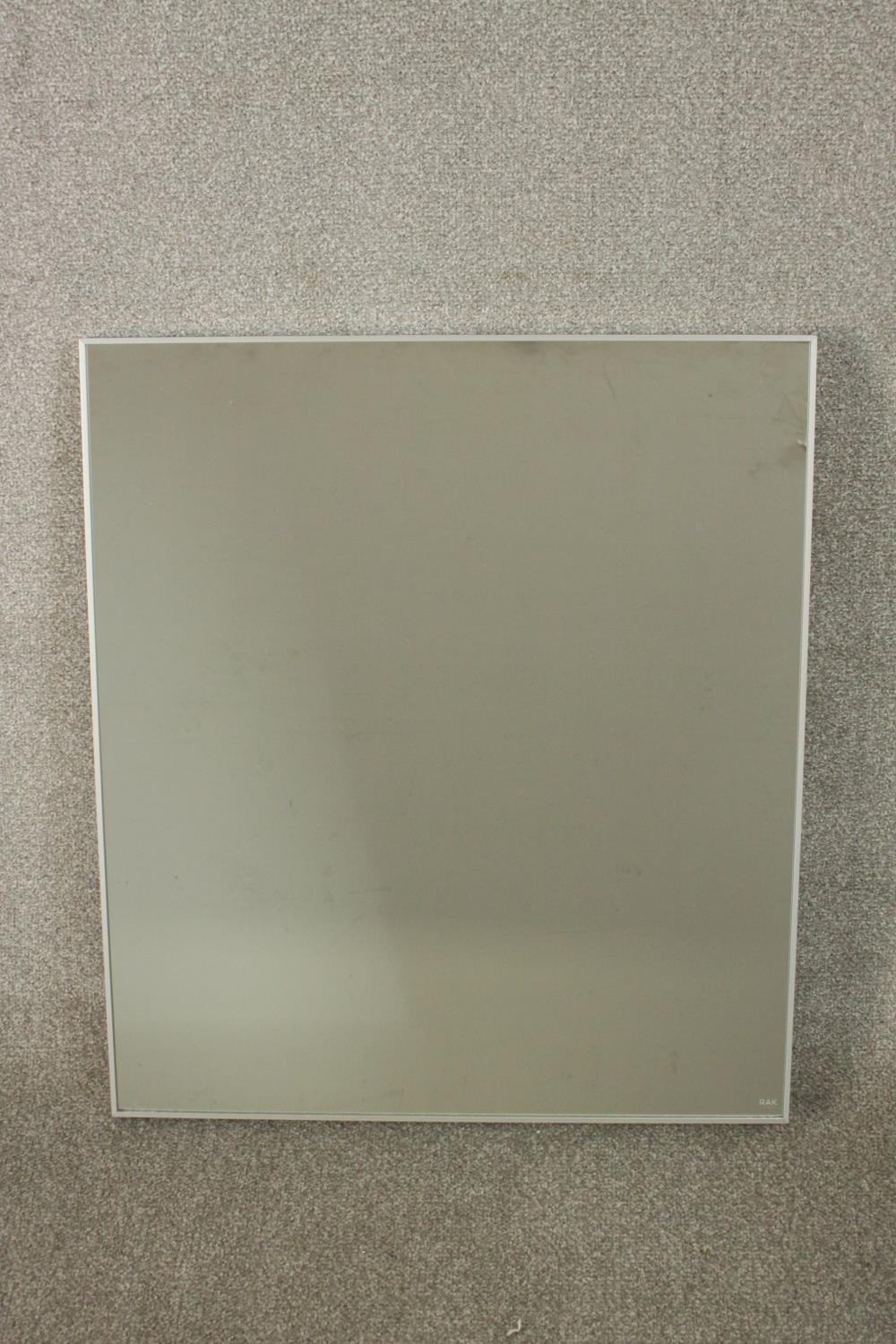 A contemporary RAK bathroom mirror, of rectangular form. H.69 W.60cm.