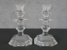 A pair of French Baccarat crystal candlesticks, in the shape of Georgian silver candlesticks, of