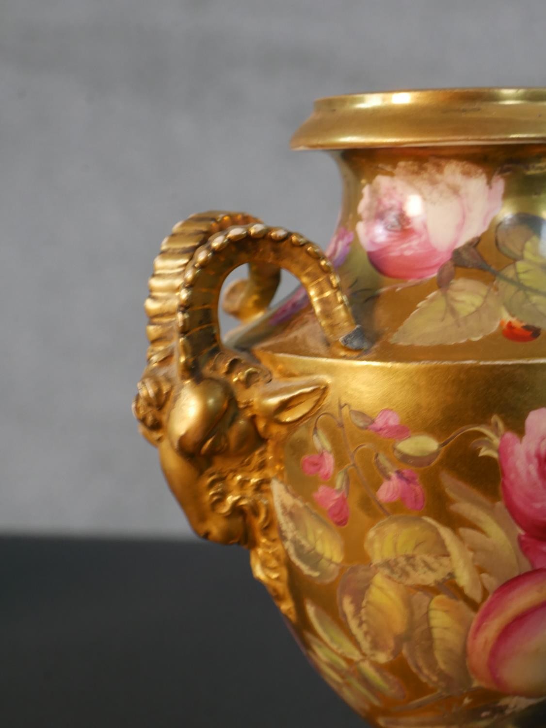 Three 19th century hand painted porcelain urns, one with gilded rams head handles and rose design ( - Image 3 of 6