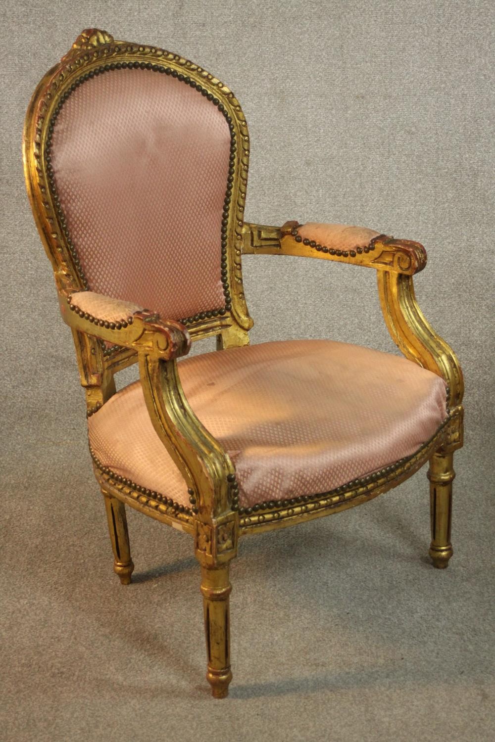 A pair of Louis XVI style giltwood fauteuil armchairs, upholstered in pink fabric to the back, - Image 4 of 12