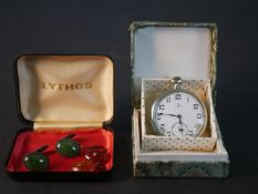 An Omega Swiss white metal pocket watch with white enamel dial (damaged and not working) along