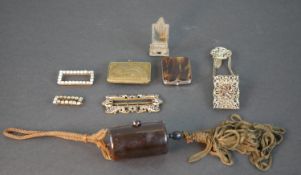 A collection of buckles, bags and other collectibles, including a cloisonné enamel rolled gold