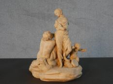 A Sevres 19th century Biscuit porcelain figure group of couple with putti. Maker's mark to the base.