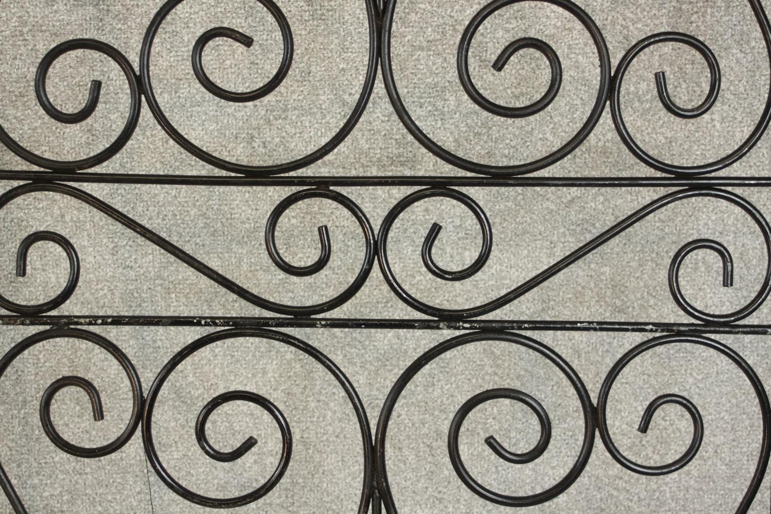 A pair of black painted wrought iron gates, decorated with spiral designs. H.177 W.64cm. (each) - Image 4 of 4