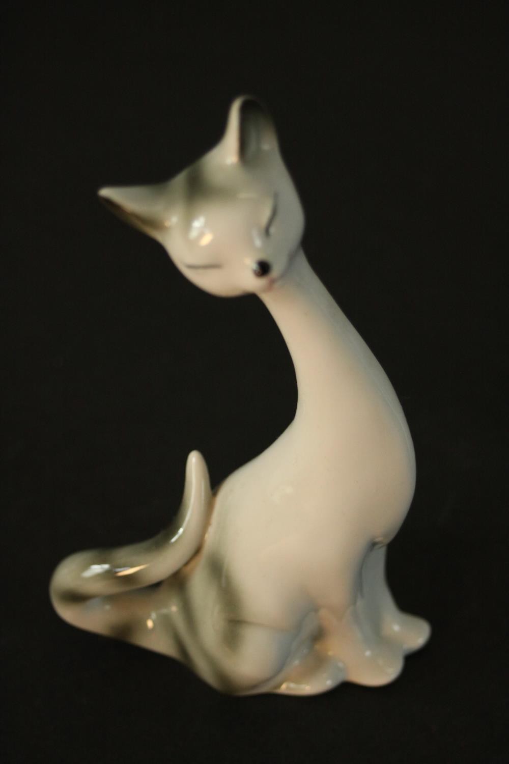 Three German porcelain Siamese cats in three different sizes, makers mark to base. H.18 W.9 D.7cm. - Image 3 of 6