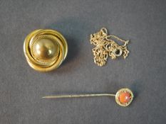 A collection of gold and yellow metal jewellery, including a 18 carat yellow gold knot brooch,