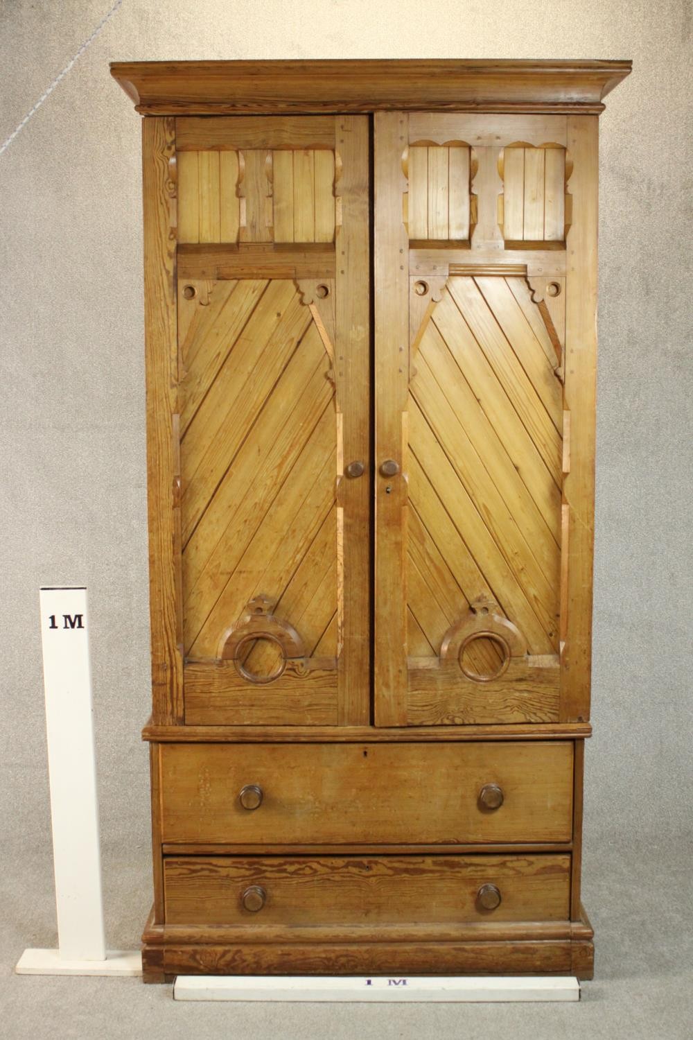 A Victorian Aesthetic movement pitch pine wardrobe, the two ecclesiastical style doors with - Image 2 of 7