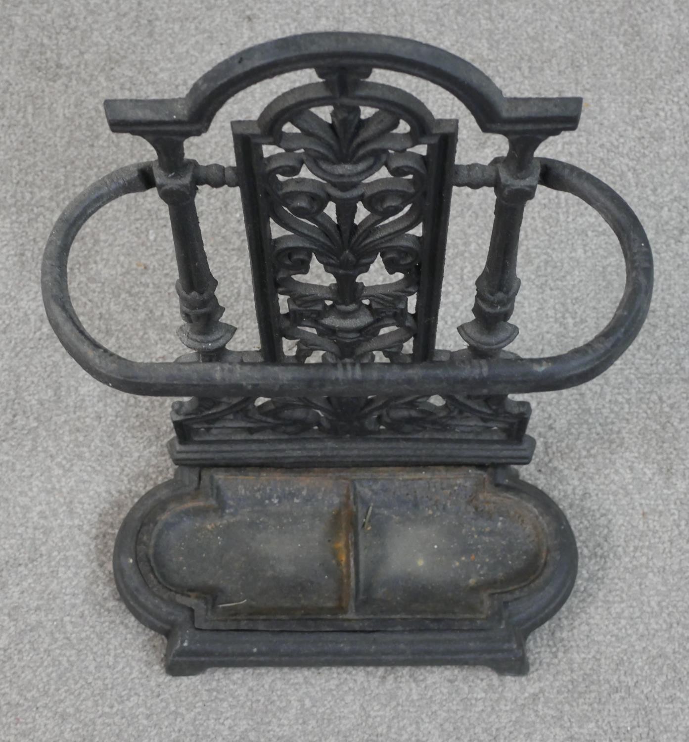 A 19th century black painted cast iron umbrella stand, with a removable drip tray. H.53 W.33 D.15cm - Image 2 of 5