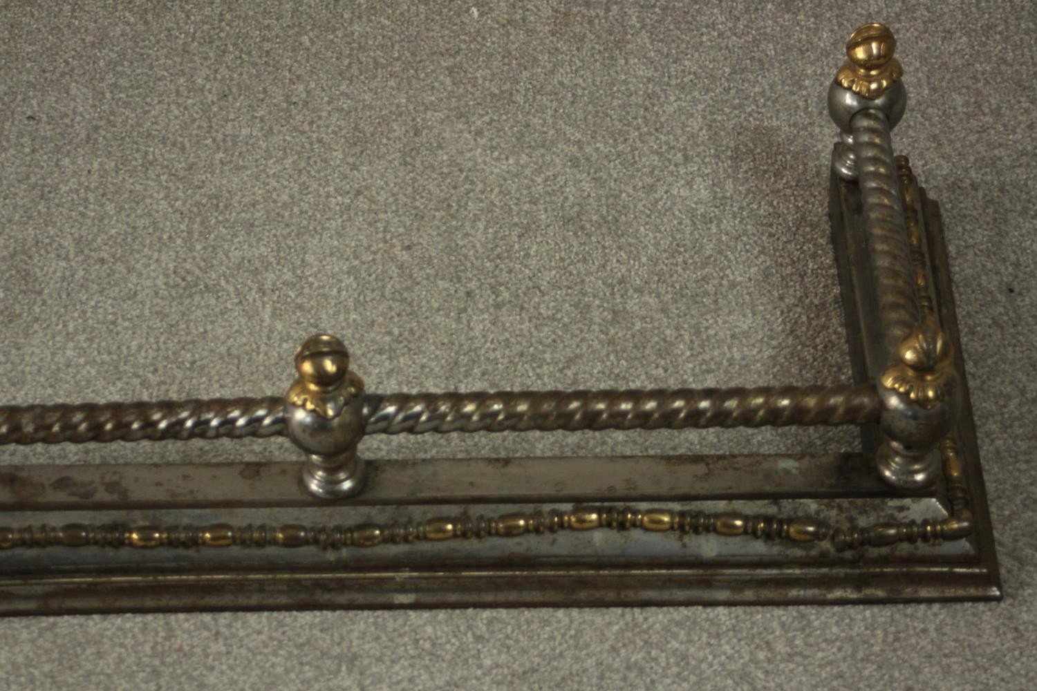 A 19th century steel and brass fender, with rope twist rail. L.170 D.40cm. - Image 5 of 9