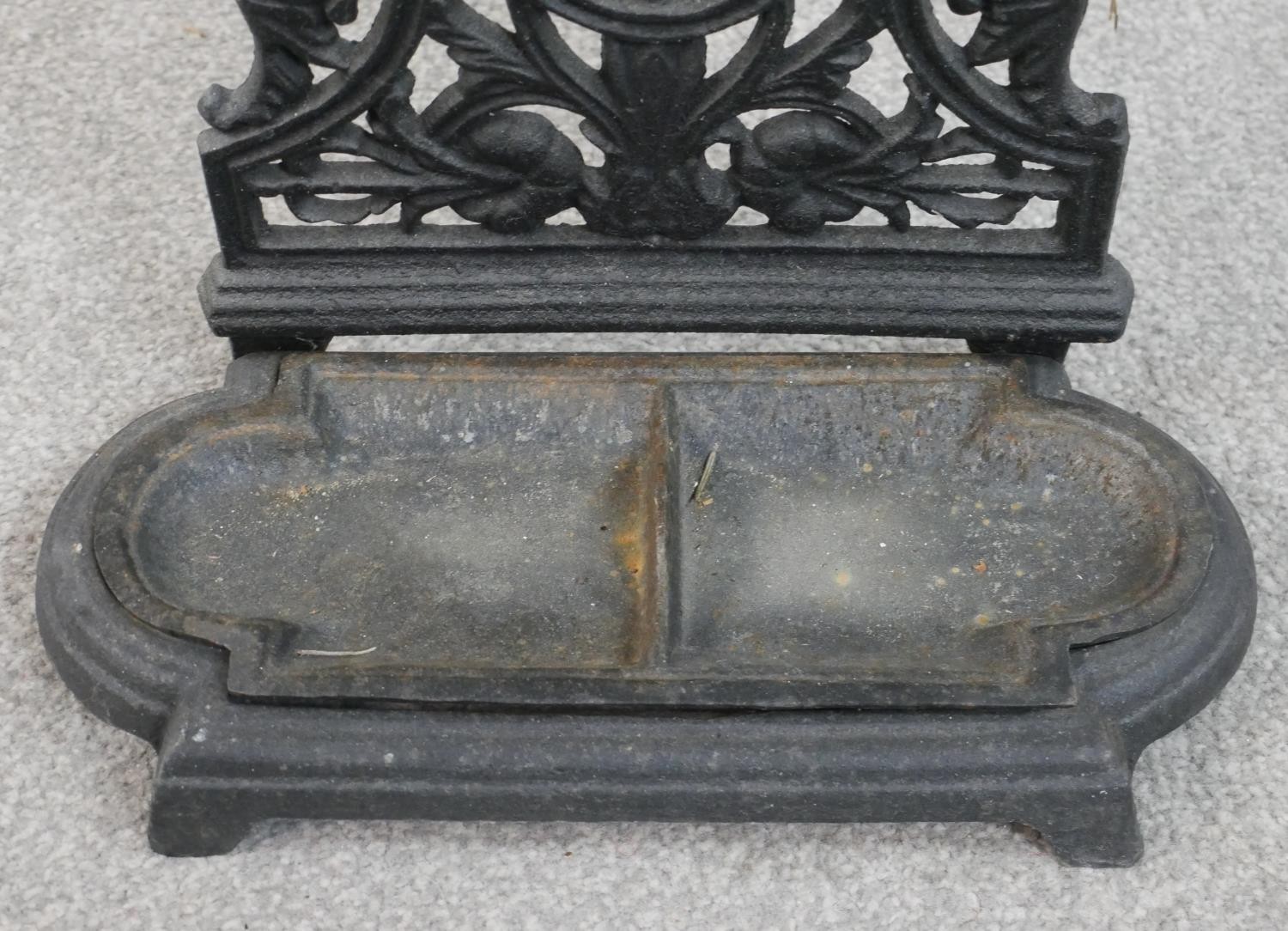 A 19th century black painted cast iron umbrella stand, with a removable drip tray. H.53 W.33 D.15cm - Image 3 of 5