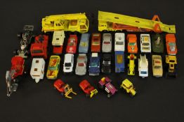 A collection of thirty one die cast toy cars and trucks, makers include Matchbox and Corgi. L.26 W.