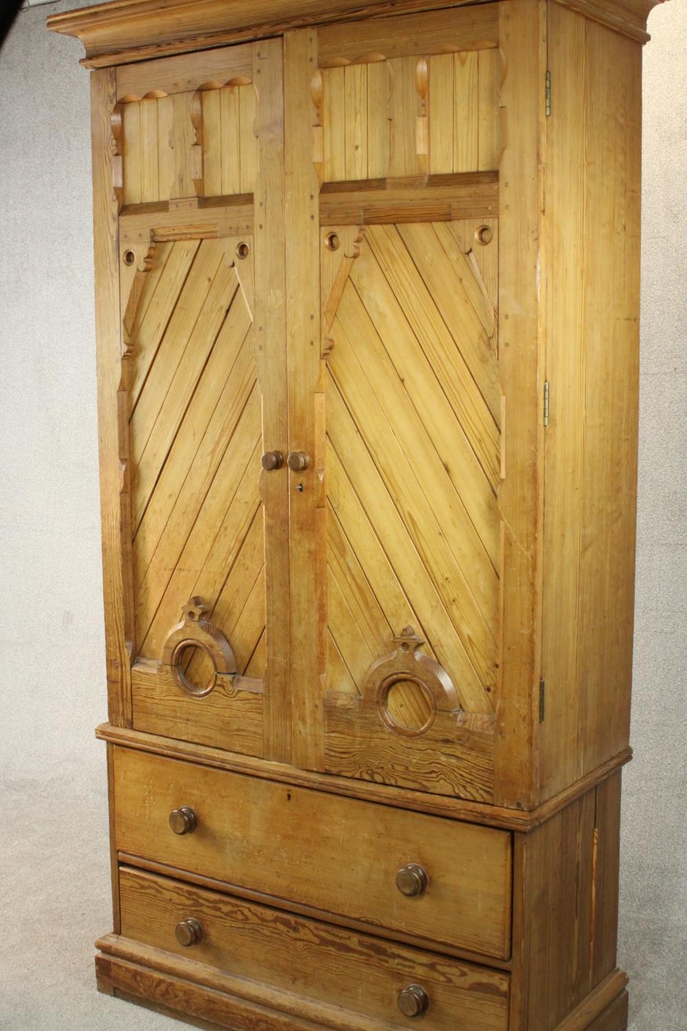 A Victorian Aesthetic movement pitch pine wardrobe, the two ecclesiastical style doors with - Image 3 of 7