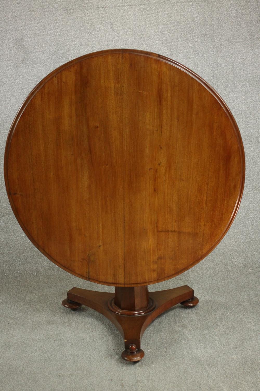 A mid 19th century walnut tilt top table, the circular top with a moulded edge, on a chamfered - Image 7 of 8