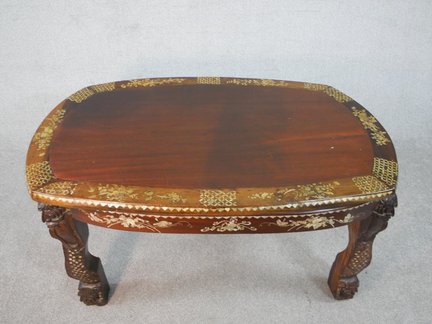 An early 20th century Chinese hardwood table with carved figural legs, all over inlaid with a mother - Image 2 of 8