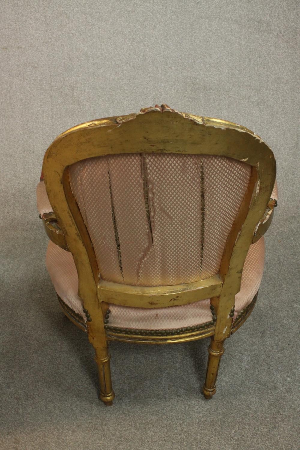 A pair of Louis XVI style giltwood fauteuil armchairs, upholstered in pink fabric to the back, - Image 9 of 12