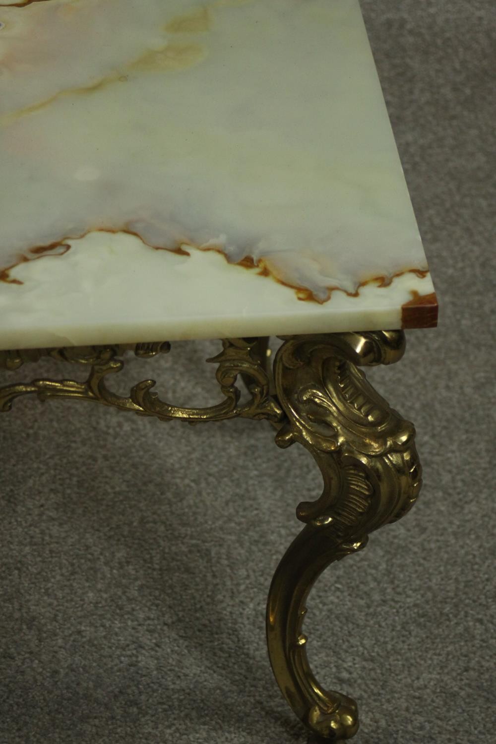 A Rococo style brass coffee table, the rectangular onyx top with a moulded edge, the base with a - Image 5 of 5