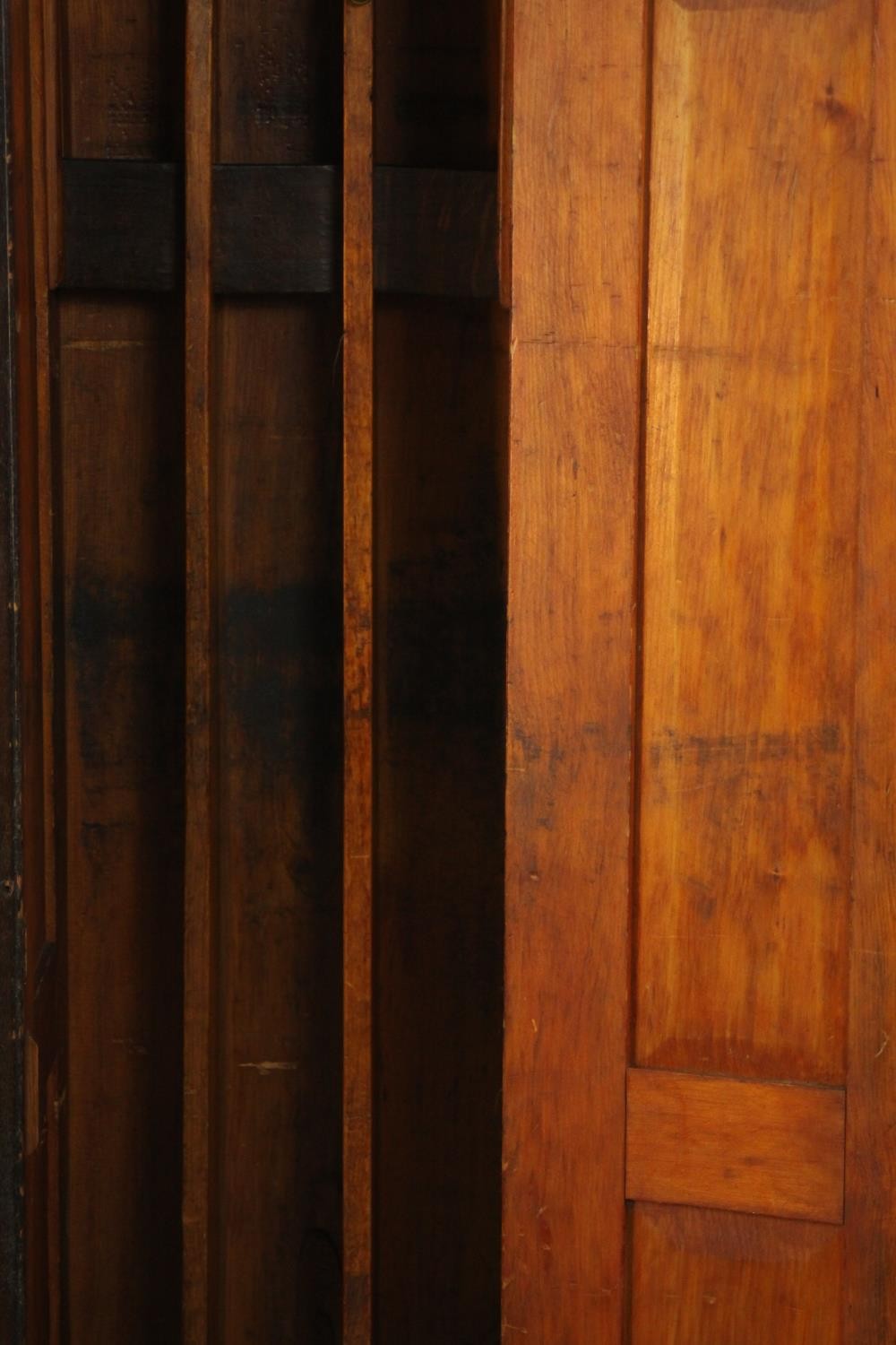A late Victorian stained pine gun cabinet, the panelled door opening to reveal space for three guns, - Image 4 of 7