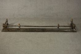 A 19th century steel and brass fender, with rope twist rail. L.170 D.40cm.
