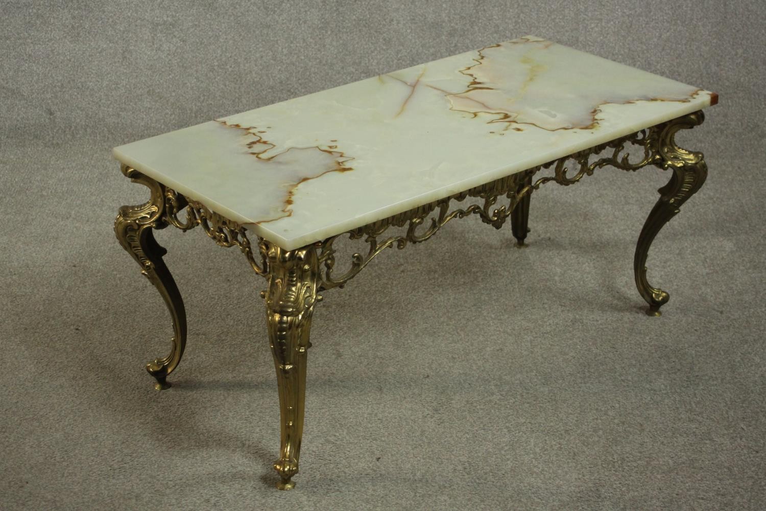 A Rococo style brass coffee table, the rectangular onyx top with a moulded edge, the base with a - Image 3 of 5