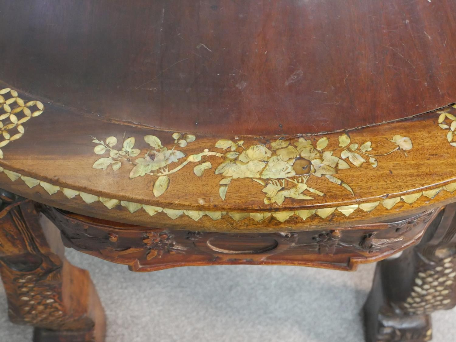 An early 20th century Chinese hardwood table with carved figural legs, all over inlaid with a mother - Image 3 of 8